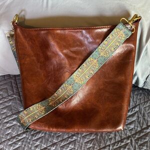 Elegant Tan Shoulder Bag with Patterned Strap